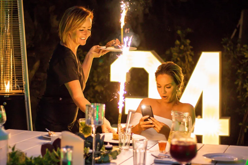 Birthday celebration with sparklers at dinner at Casa Amore, a milestone birthday villa in Tenerife