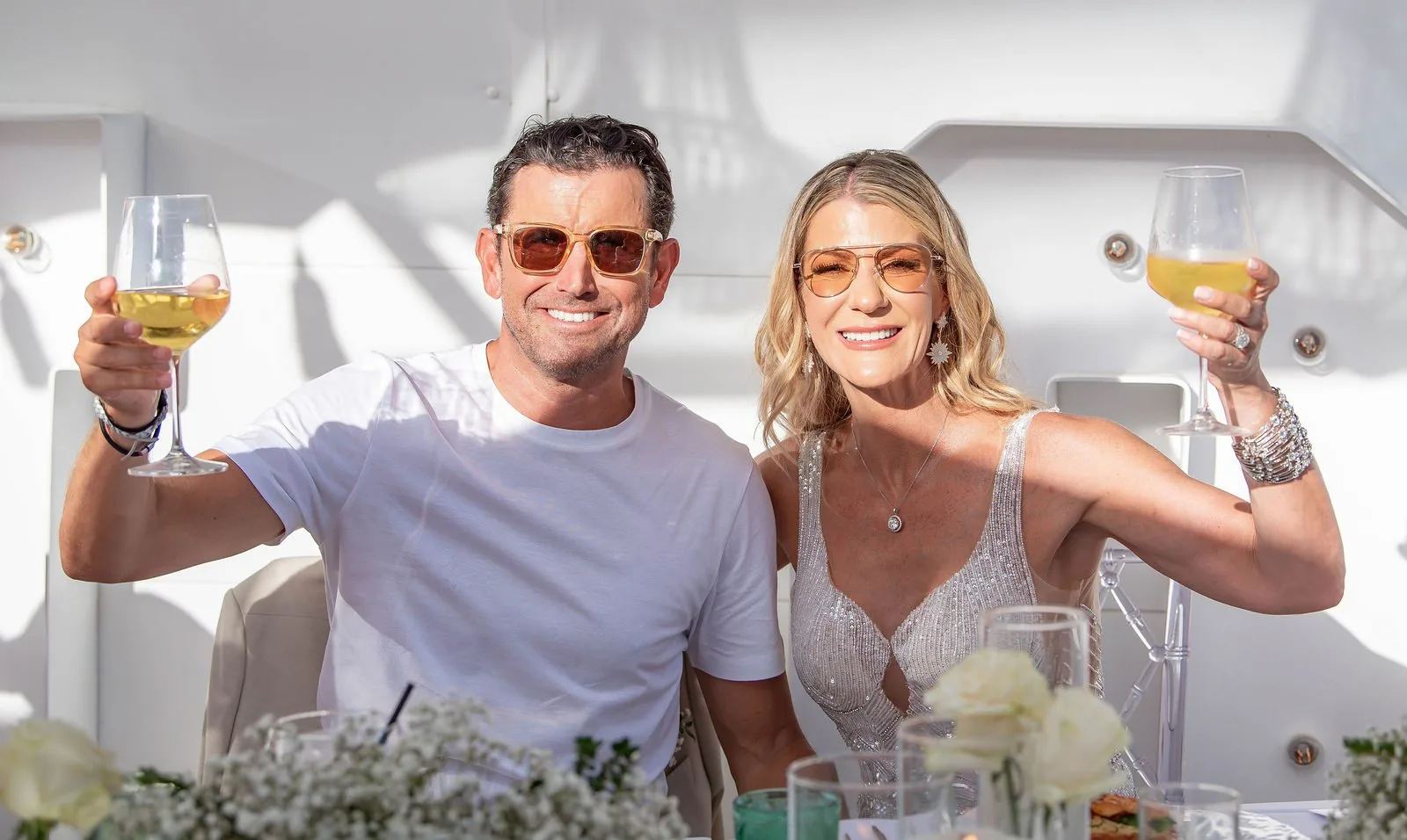 Couple raising a toast at their celebration lunch at Casa Amore Tenerife